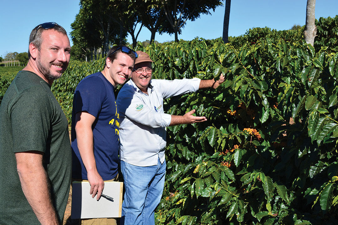 Fresh Roasted Coffee owner and son visit origin. 